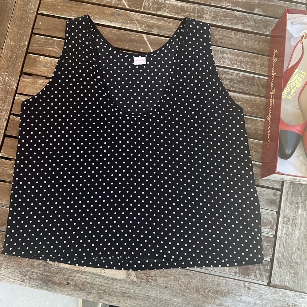 High low, vintage, like new. Size is listed as 38 M/L